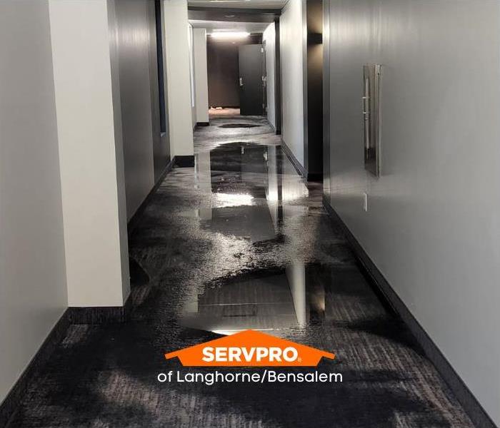 flooded hallway in apartment complex